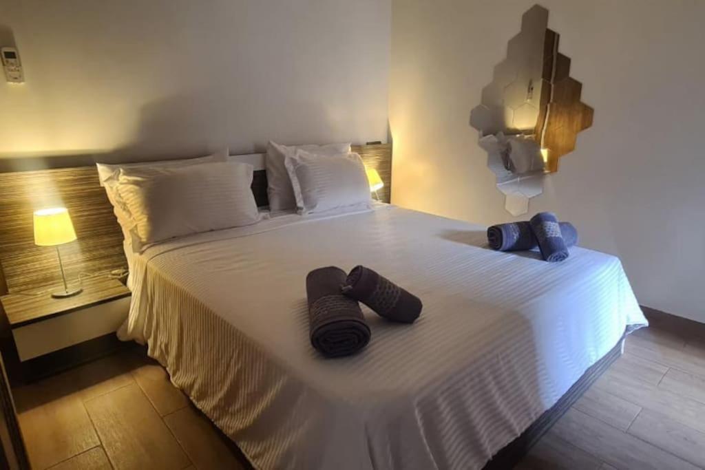 Ένα ή περισσότερα κρεβάτια σε δωμάτιο στο appartement de luxe gueliz