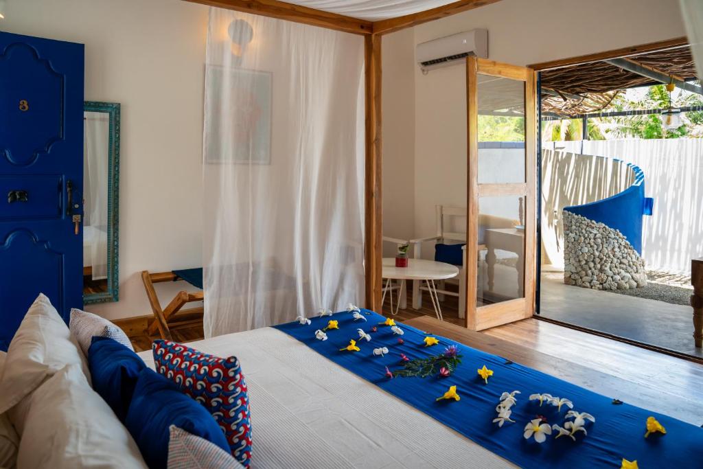 Postel nebo postele na pokoji v ubytování Amanta Beach