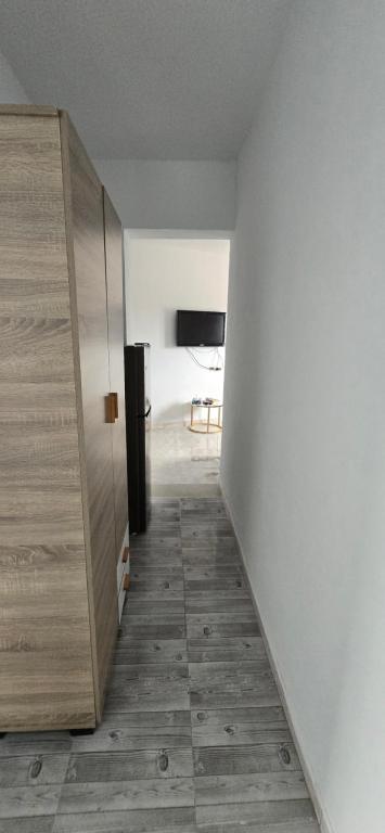 TV a/nebo společenská místnost v ubytování Ain draham sejour 2, appartement trois pièces privé, seulement familles