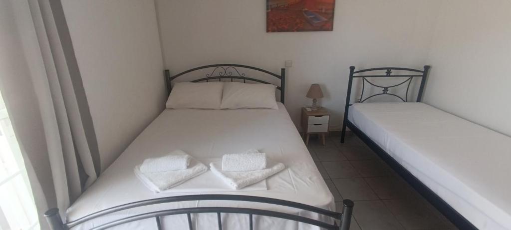 Posteľ alebo postele v izbe v ubytovaní CAMARES HOUSE