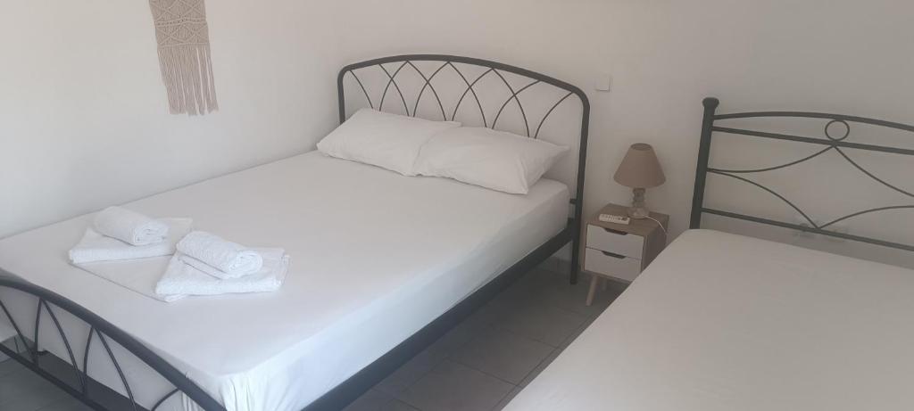 Posteľ alebo postele v izbe v ubytovaní CAMARES HOUSE