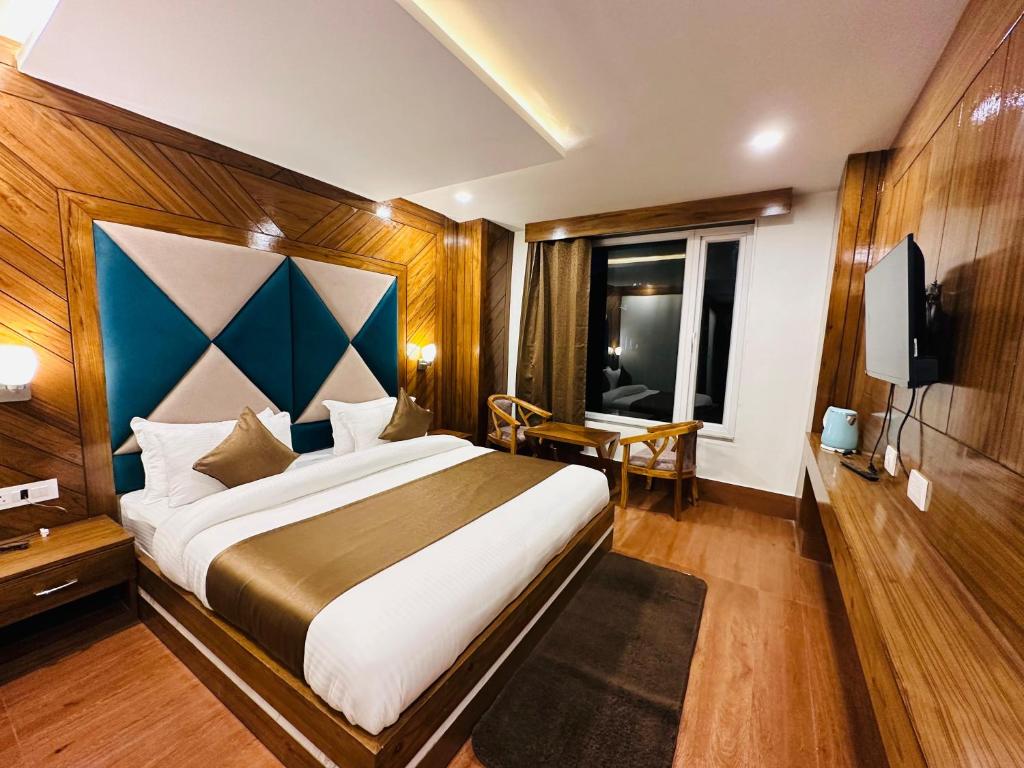 Katil atau katil-katil dalam bilik di Hotel Vishranti