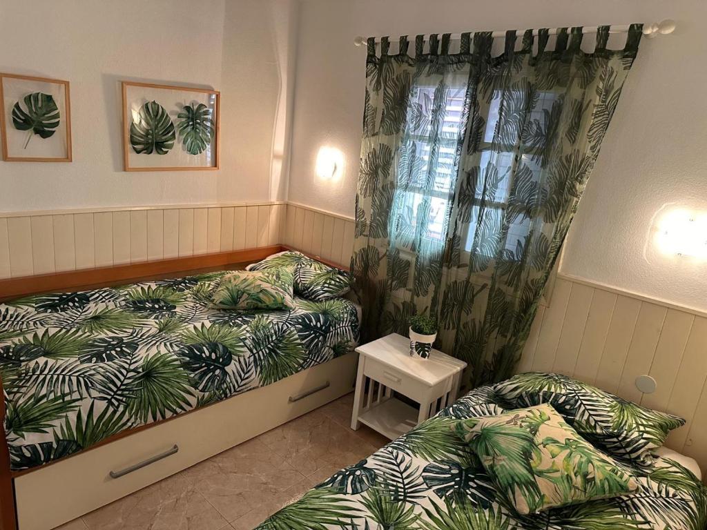 Postel nebo postele na pokoji v ubytování Vcv Apartamento Star