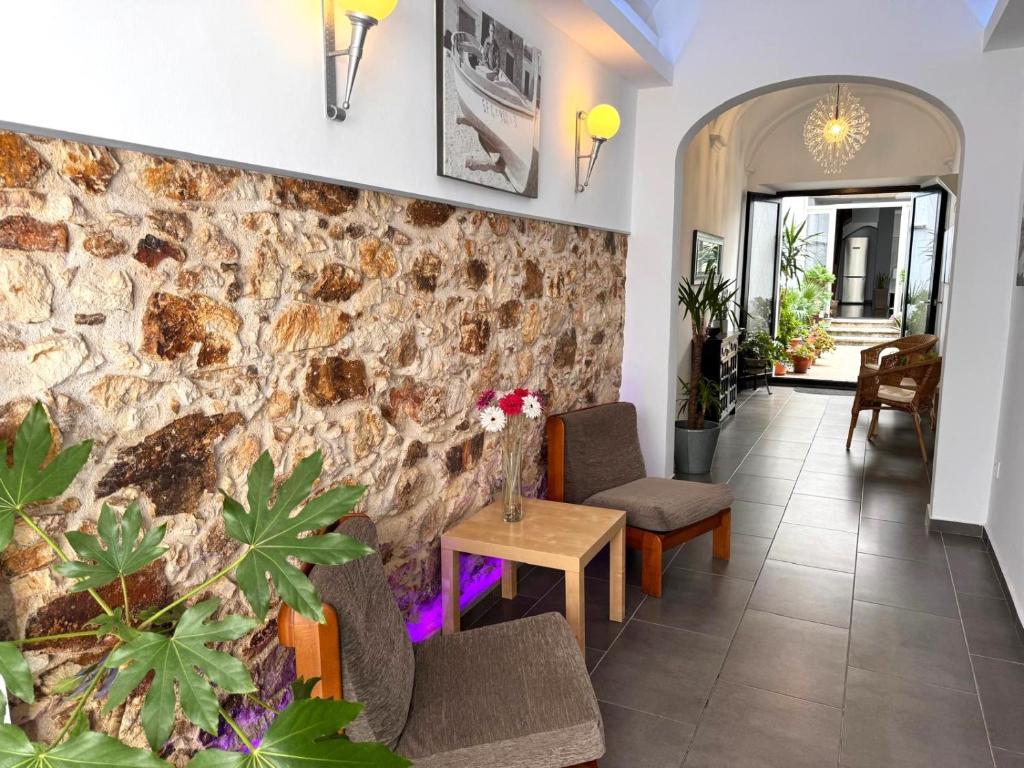 Posedenie v ubytovaní Hostal Mediterráneo