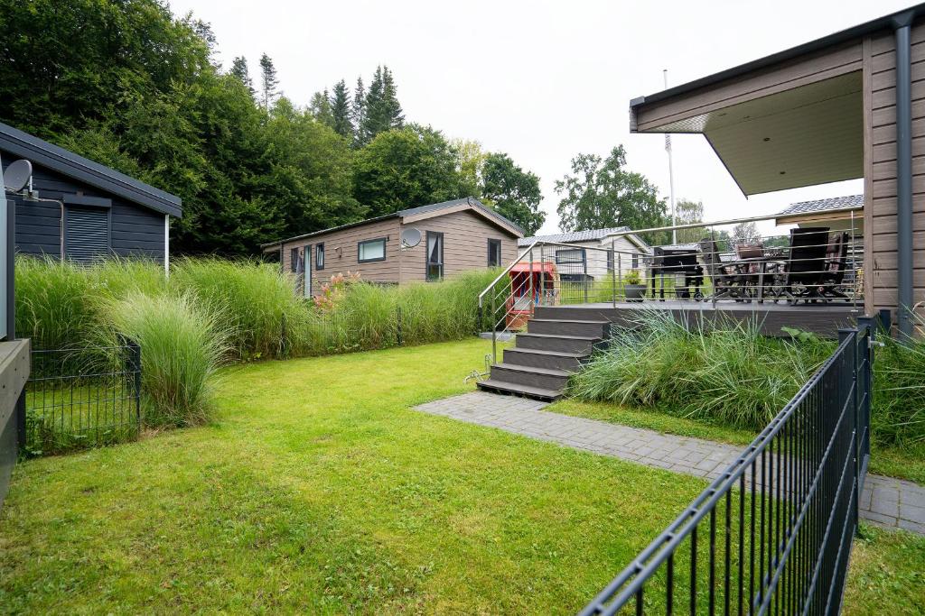 Zahrada ubytování Casa del Mar Scharbeutz - Sauna kostenlos - 1 kleiner Hund willkommen - umzäunter Garten
