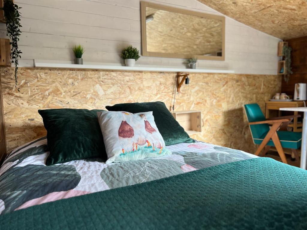 Postel nebo postele na pokoji v ubytování Le chalet des 3 canards