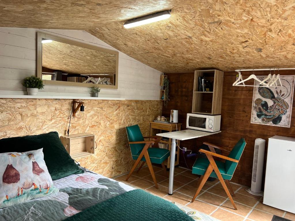 Kuchyň nebo kuchyňský kout v ubytování Le chalet des 3 canards
