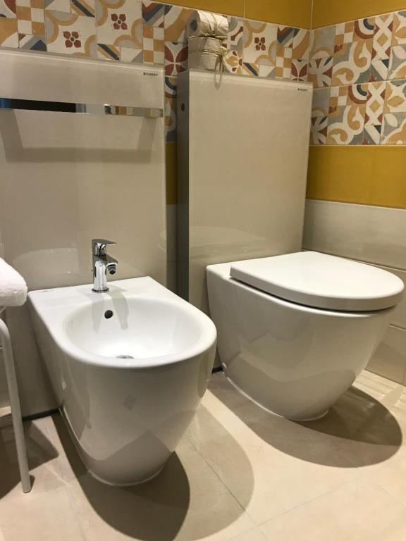 Koupelna v ubytování Hotel Suite Inn