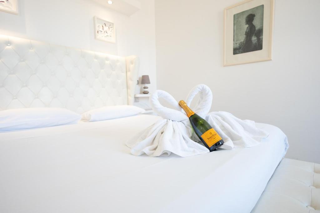 Voodi või voodid majutusasutuse Romerooms Cola di Rienzo toas