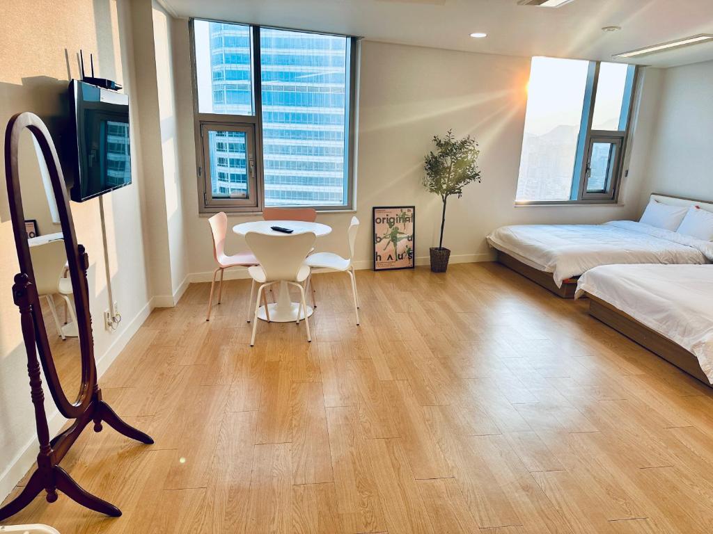 "GRAND OPENED" Maxtyle Guesthouse Dongdaemunにあるベッド