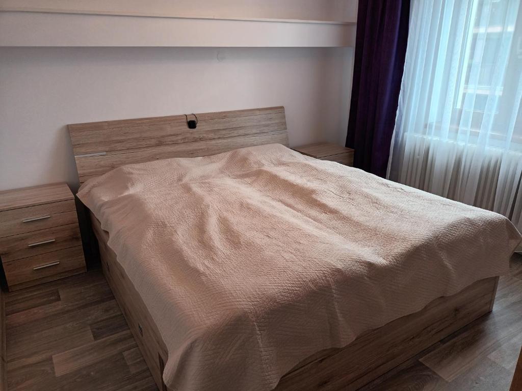 Postel nebo postele na pokoji v ubytování Byt v řadovém domě
