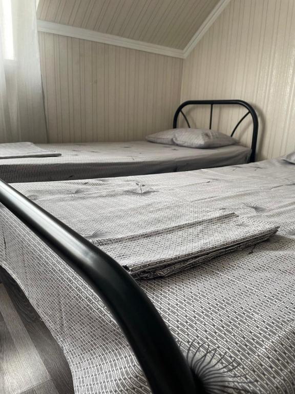 Postel nebo postele na pokoji v ubytování VIP hostel