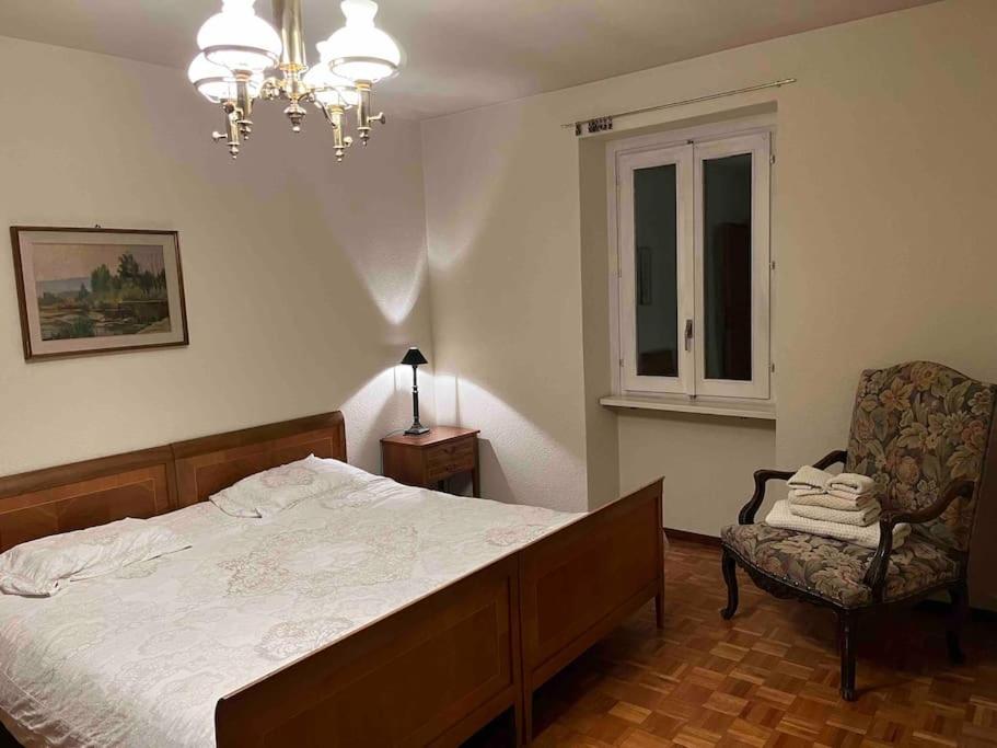 Postel nebo postele na pokoji v ubytování Sunny apartment in Lugano