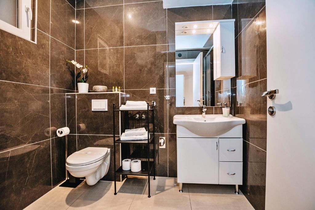 Kúpeľňa v ubytovaní CentRooms Kovac1
