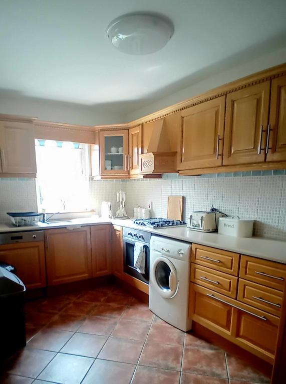 Kuchyň nebo kuchyňský kout v ubytování Comfortable House