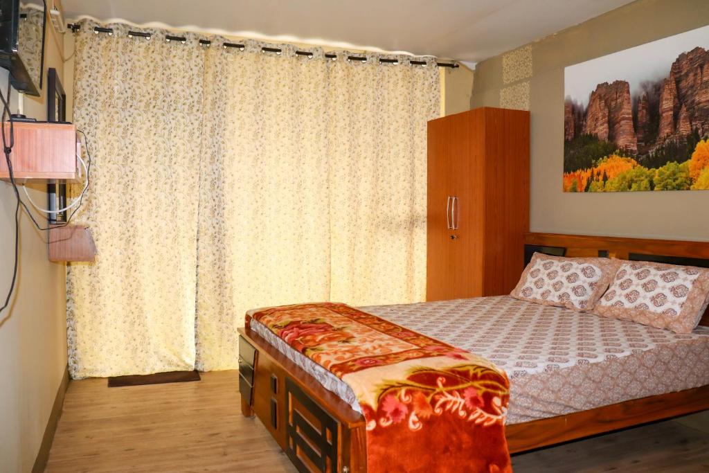 Postel nebo postele na pokoji v ubytování Themapleview