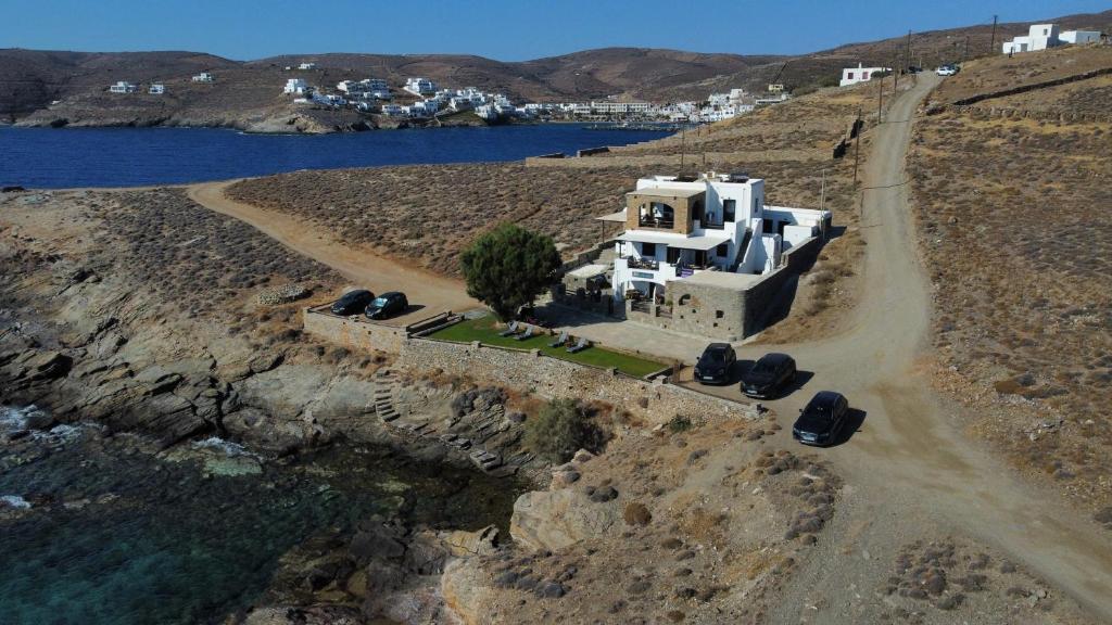 an aerial view of a house on a mountain at Niriides Studios & Apartments in Kithnos