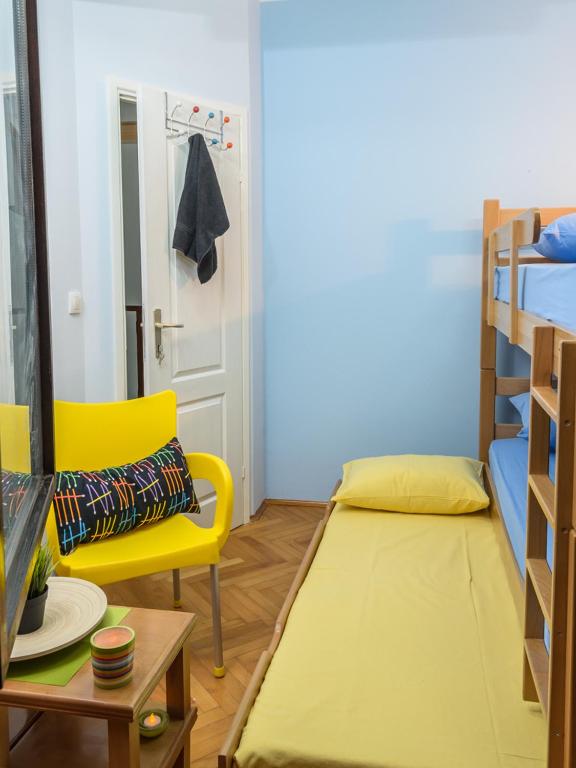 Postel nebo postele na pokoji v ubytování Hostel White Town