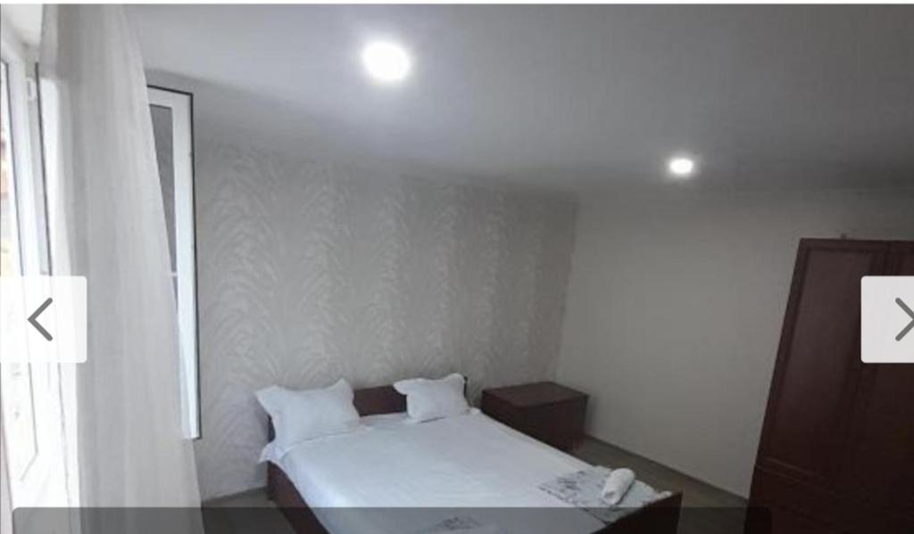 Postel nebo postele na pokoji v ubytování HOTEL LukaRabati