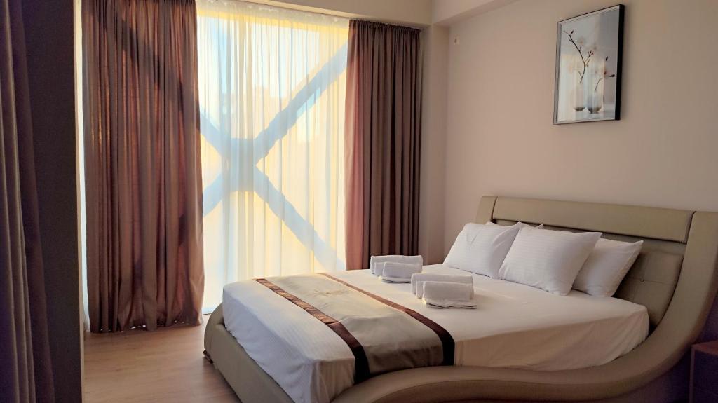 Postel nebo postele na pokoji v ubytování Hotel Red Tower