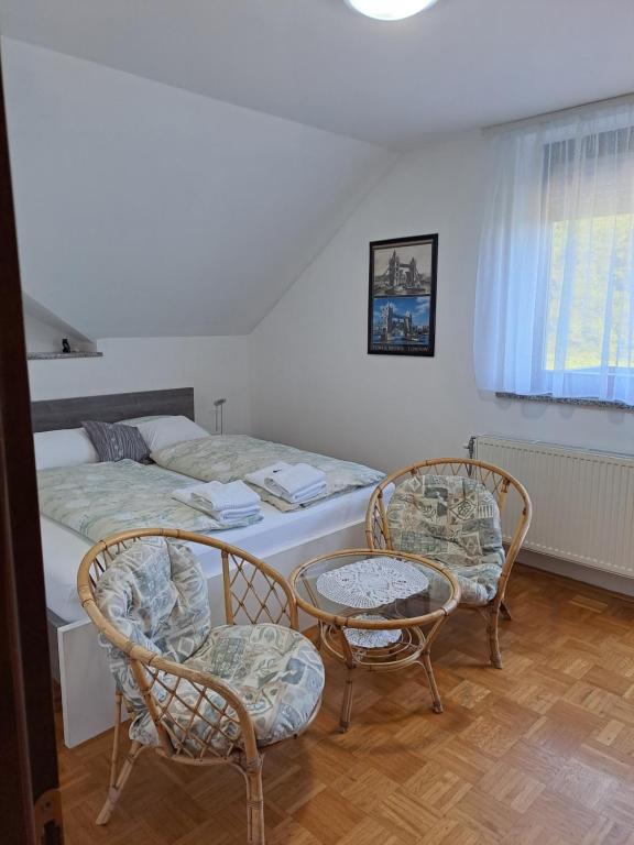 Postel nebo postele na pokoji v ubytování Apartma Juteršek