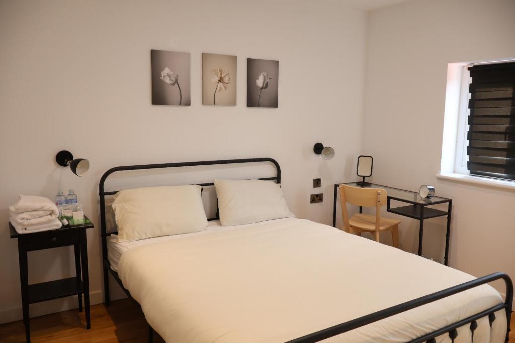 Postel nebo postele na pokoji v ubytování Wilmer House