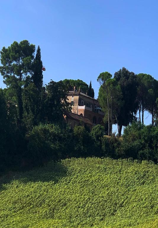 a house sitting on top of a hill at Todi Villa San Martino in Todi