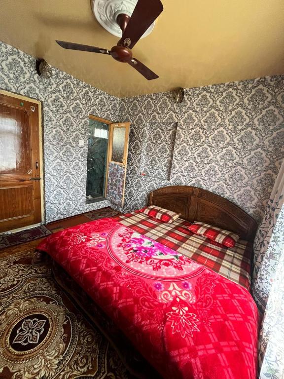 Postel nebo postele na pokoji v ubytování shahin heritage and homestays