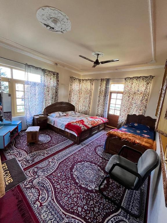 Postel nebo postele na pokoji v ubytování shahin heritage and homestays