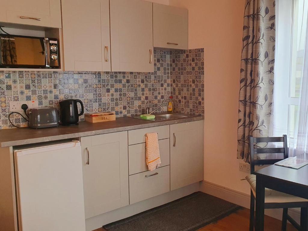 Kuchyň nebo kuchyňský kout v ubytování O'Connor's Accommodation