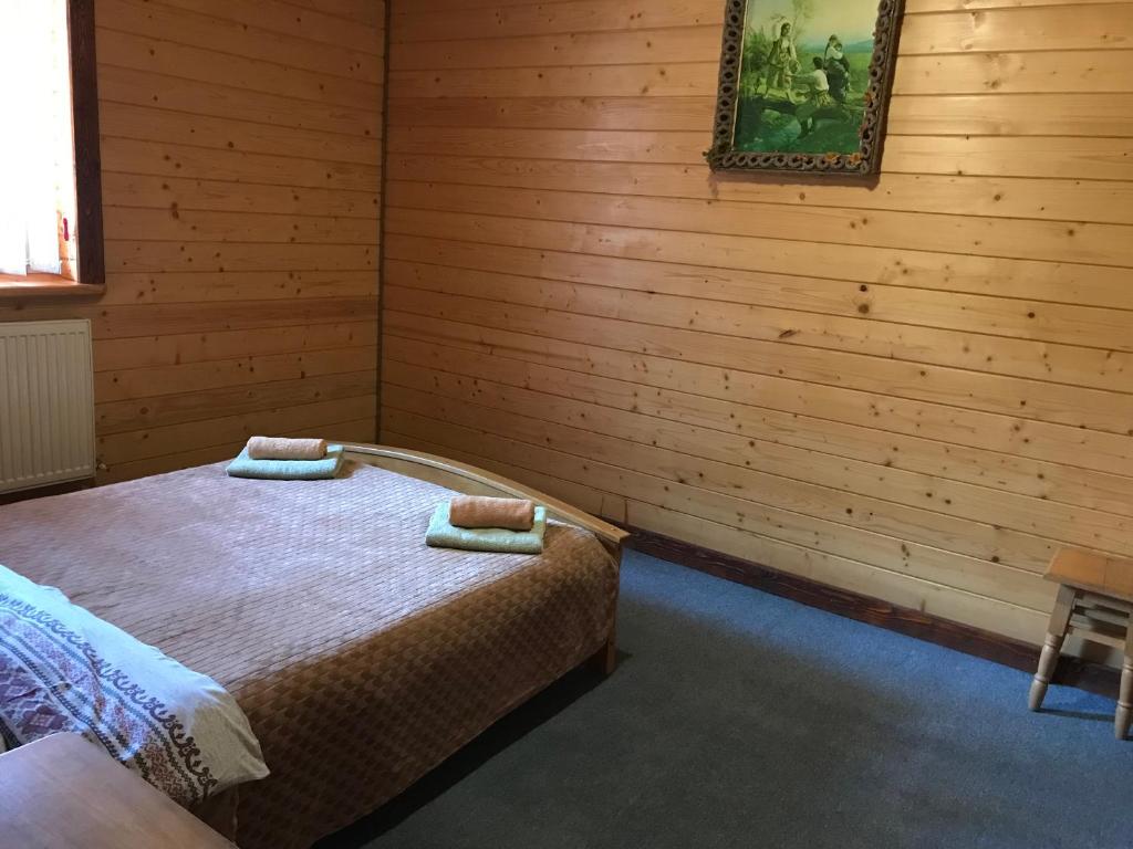 Postel nebo postele na pokoji v ubytování Trembita готель