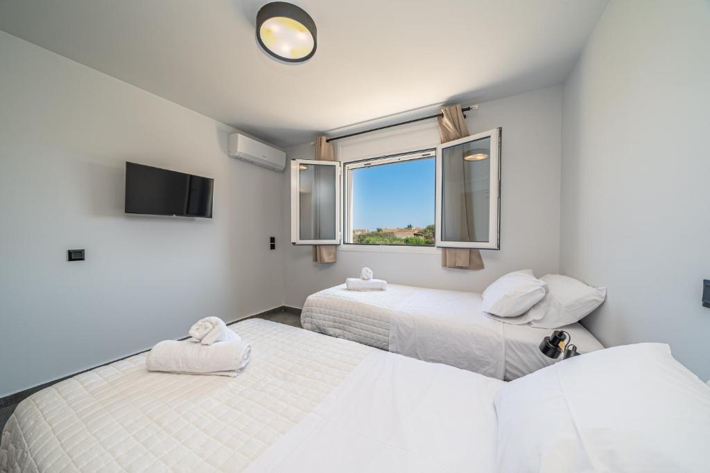 Postel nebo postele na pokoji v ubytování Pecora Nera apartments