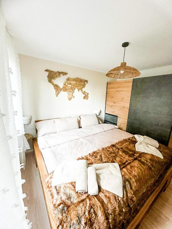 Postel nebo postele na pokoji v ubytování Charmant appartement avec vue splendide