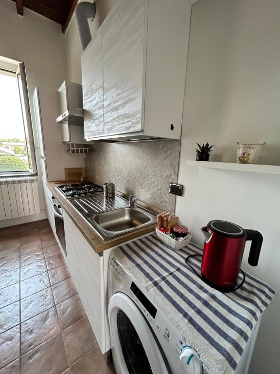Kuchyň nebo kuchyňský kout v ubytování Residenza Dora