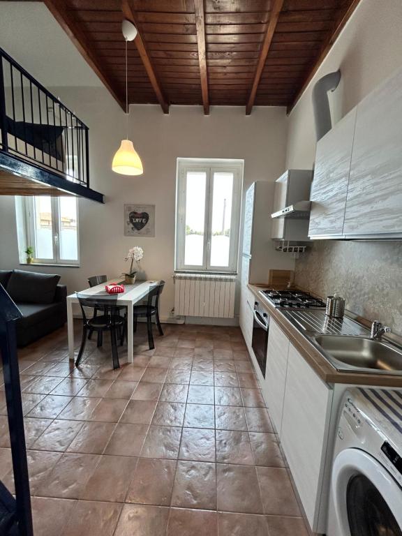 Kuchyň nebo kuchyňský kout v ubytování Residenza Dora