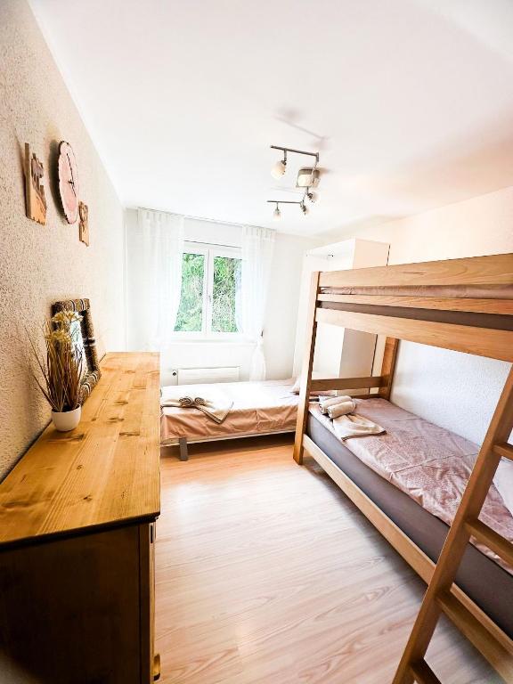 Postel nebo postele na pokoji v ubytování Charmant appartement avec vue splendide