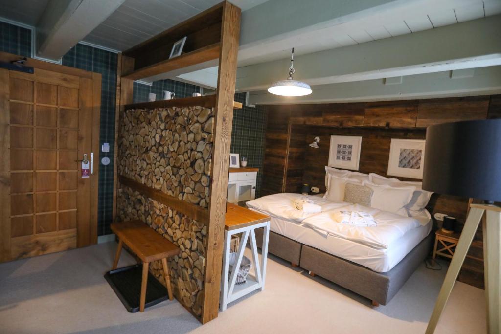 Postel nebo postele na pokoji v ubytování Hotel Bouda Helena