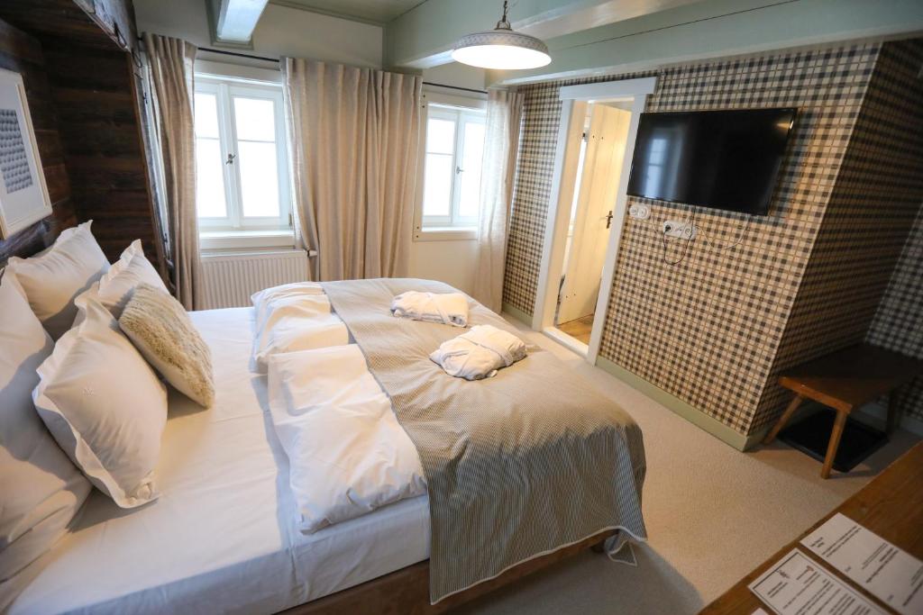 Postel nebo postele na pokoji v ubytování Hotel Bouda Helena