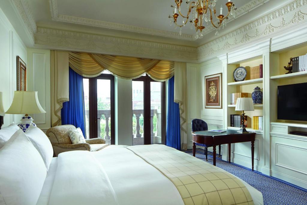 Postel nebo postele na pokoji v ubytování The Ritz-Carlton, Tianjin