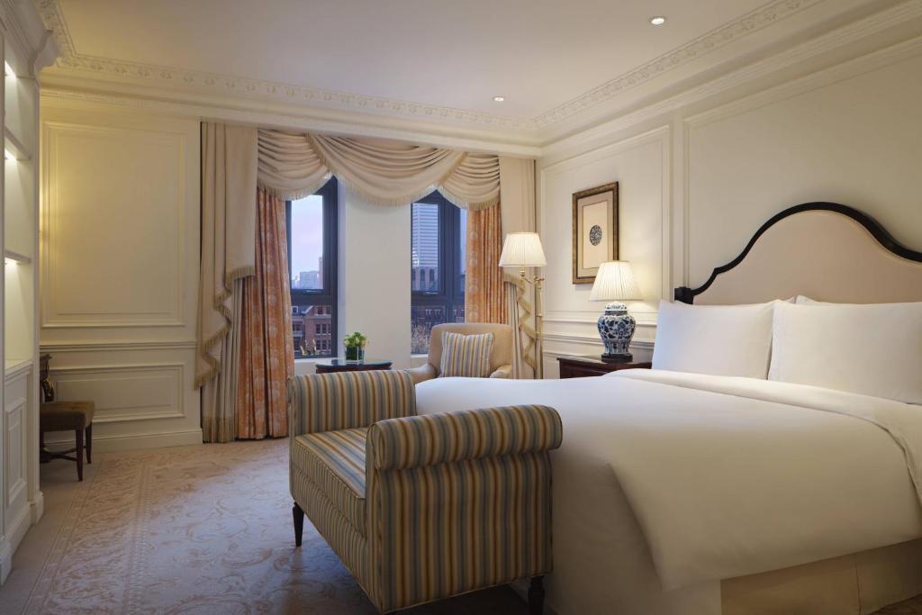 Postel nebo postele na pokoji v ubytování The Ritz-Carlton, Tianjin