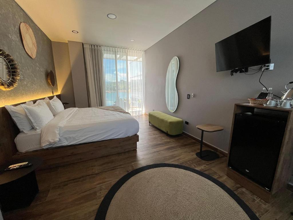 Postel nebo postele na pokoji v ubytování Vivanti Resort