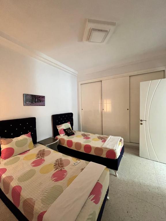 Postel nebo postele na pokoji v ubytování Appartements de luxe près de la mer