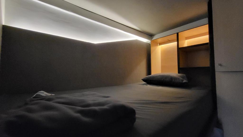 Postel nebo postele na pokoji v ubytování Happy House BnB Bromo backpacker