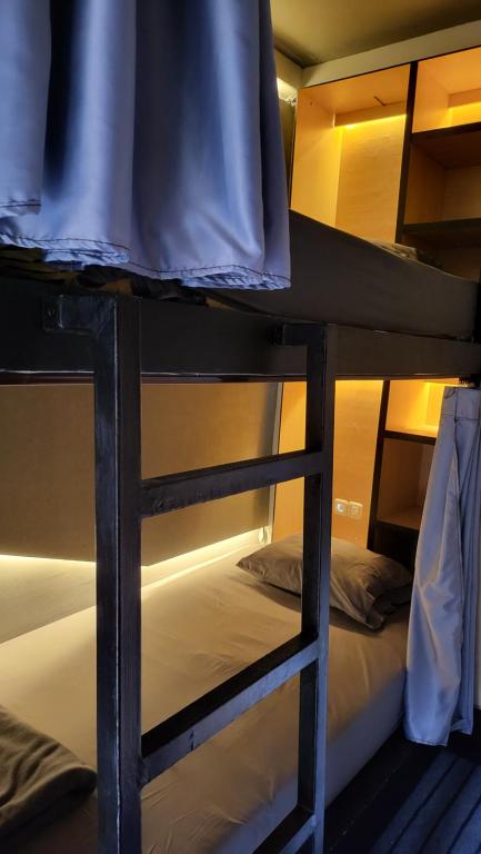 Postel nebo postele na pokoji v ubytování Happy House BnB Bromo backpacker