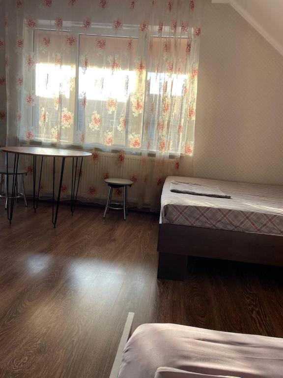 Postel nebo postele na pokoji v ubytování VIP hostel