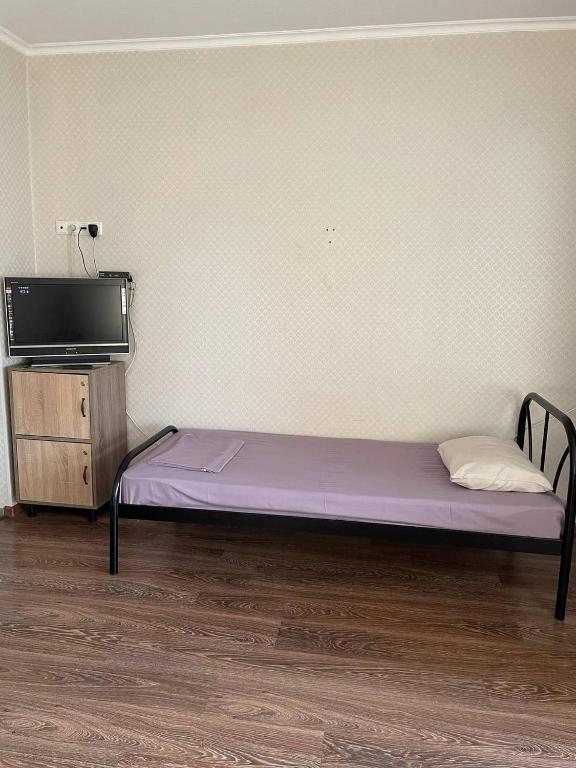 Postel nebo postele na pokoji v ubytování VIP hostel