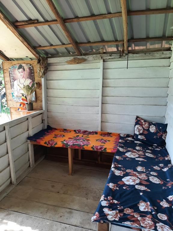 Postel nebo postele na pokoji v ubytování Serenity house in Dambulla