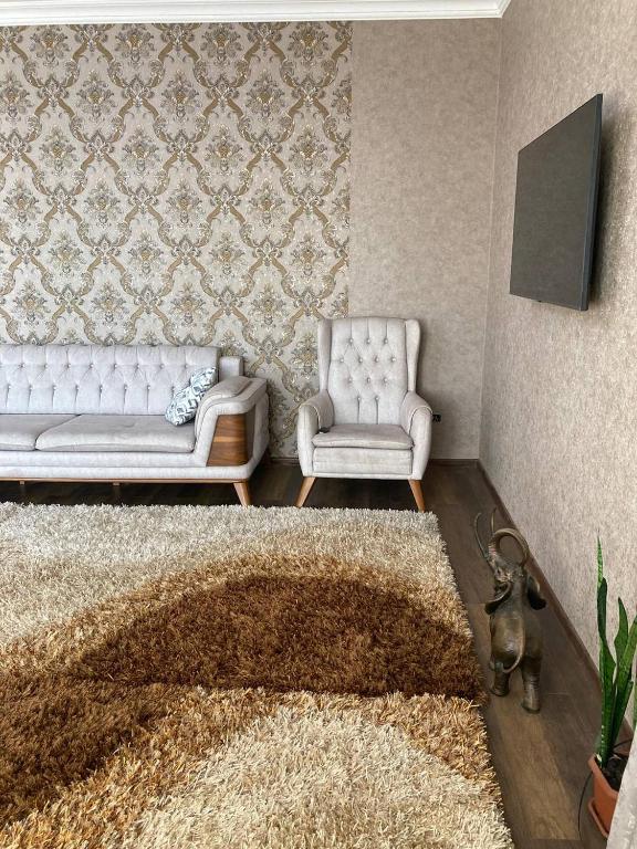 TV a/nebo společenská místnost v ubytování Riverside Cottage Poti