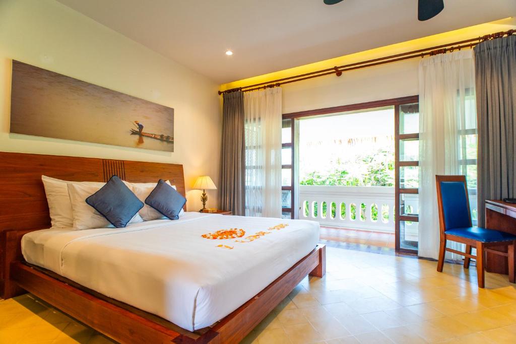 Phòng Premier Giường Đôi/2 Giường Đơn Có Ban Công Và Tầm Nhìn Ra Vườn