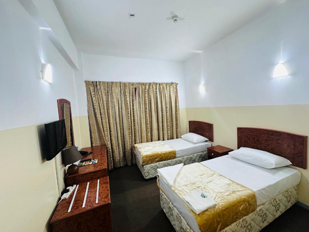 Queens Hotel Next Sabkha Bus Station - Resim 39